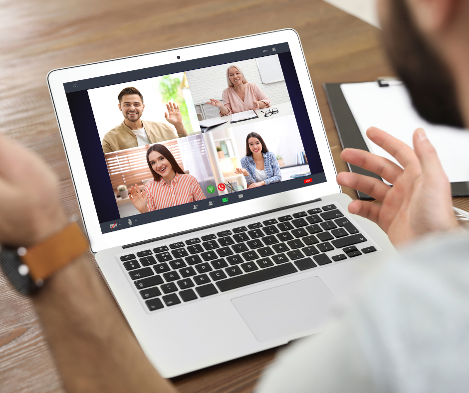 A child and parent signing during an online ASL class